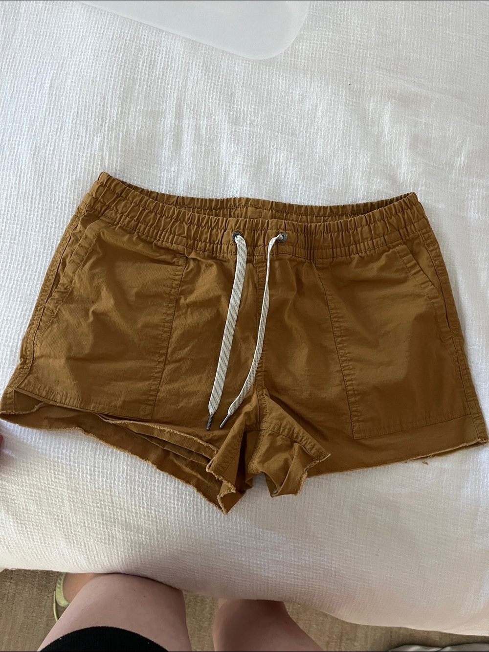 Vuori Women's Drawstring Athletic Shorts in Brown